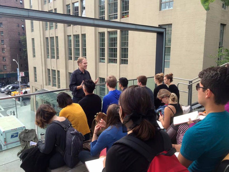 Lecturer Scott Francisco speaks to students on the High Line.