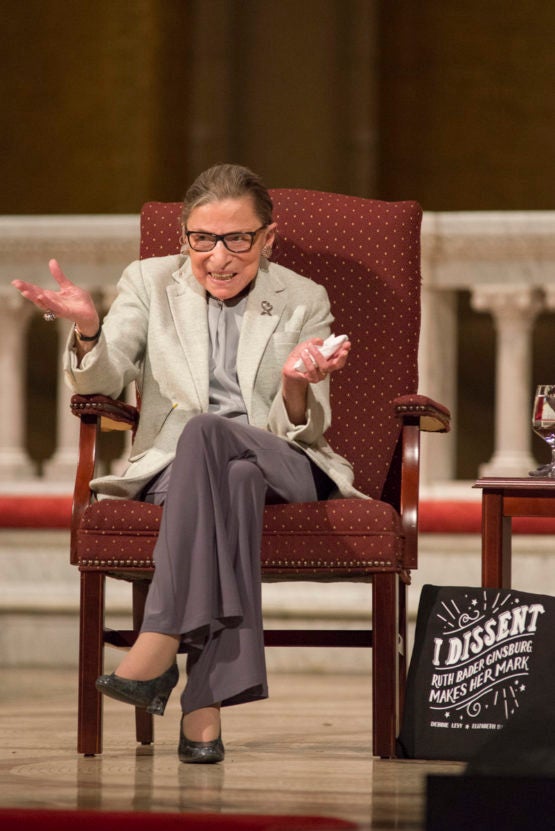 Ruth Bader Ginsburg in a chair