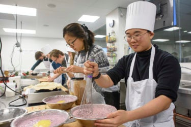 students mixing a pie filling