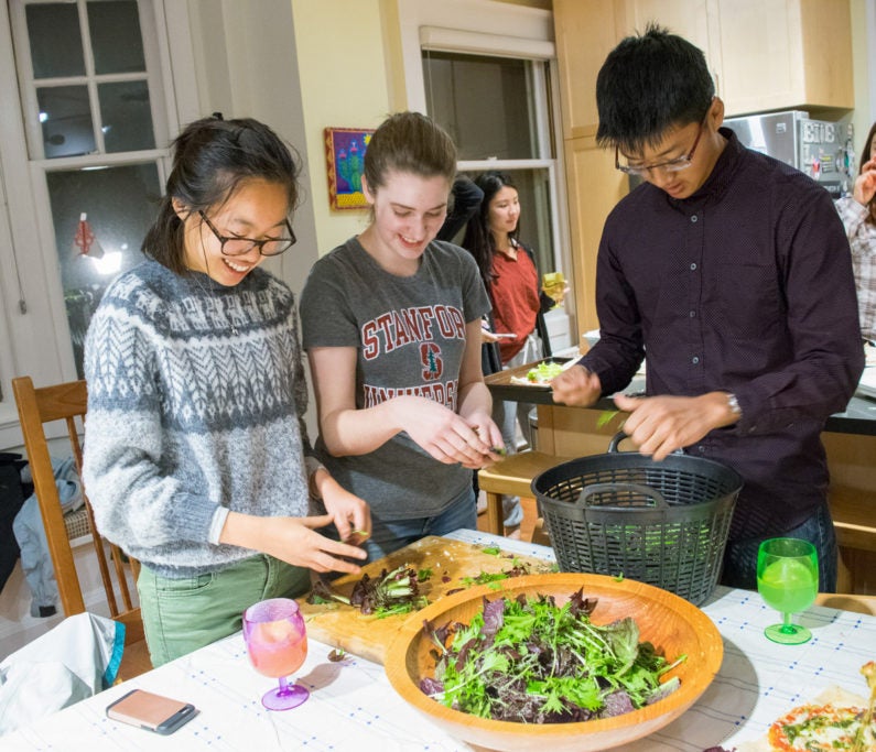 3 students make salad