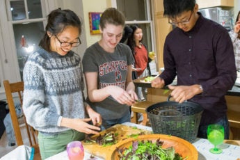 students make salad at Roble Hall