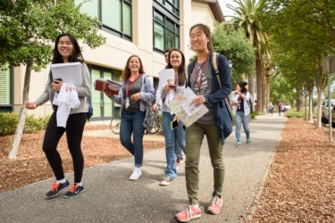 groups of admits walking together to explore campus