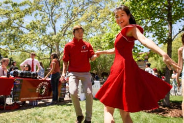 students dance the Lindy Hop at Admit Weekend activities fair