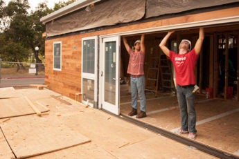 Students install the sliding doors on the start.home