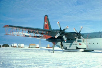 An American military C-130 cargo plane converted for Antarctic radar surveys at Williams Field in Antarctica’s McMurdo Sound.