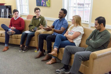 Five students speak as part of a multifaith panel