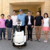 JackRabbot project team with their robot