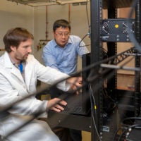 Researcher Greg Nachtrab, left, and Assistant Professor Xiaoke Chen