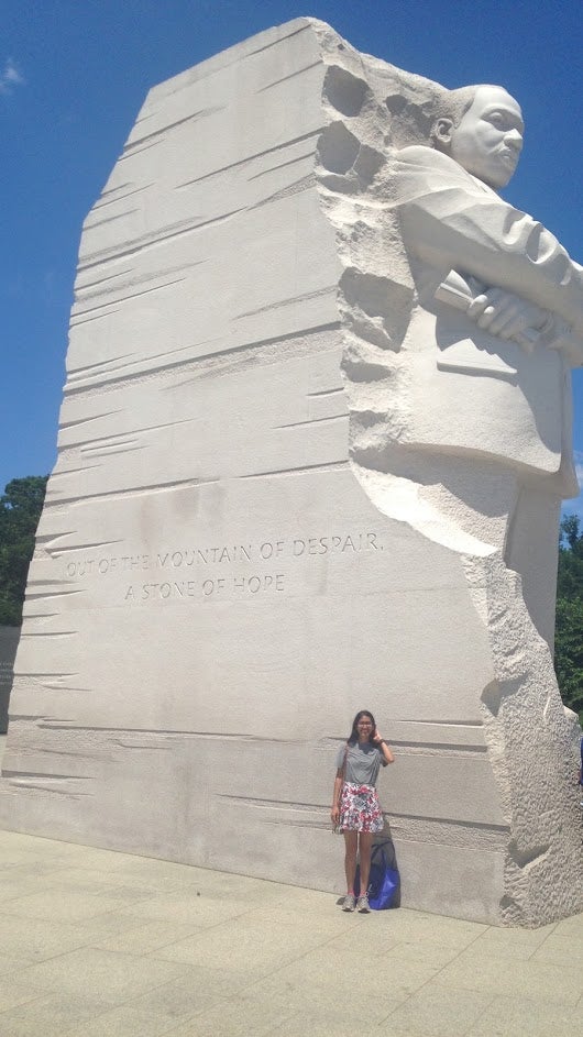 Kendra Mysore standing in front of the Martin Luther King, Jr. Memorial in Washington, D.C.