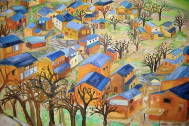 Bird's-eye view of homes with blue roofs and leafless trees
