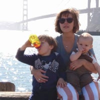 Zuckerman and kids pose by Golden Gate Bridge.