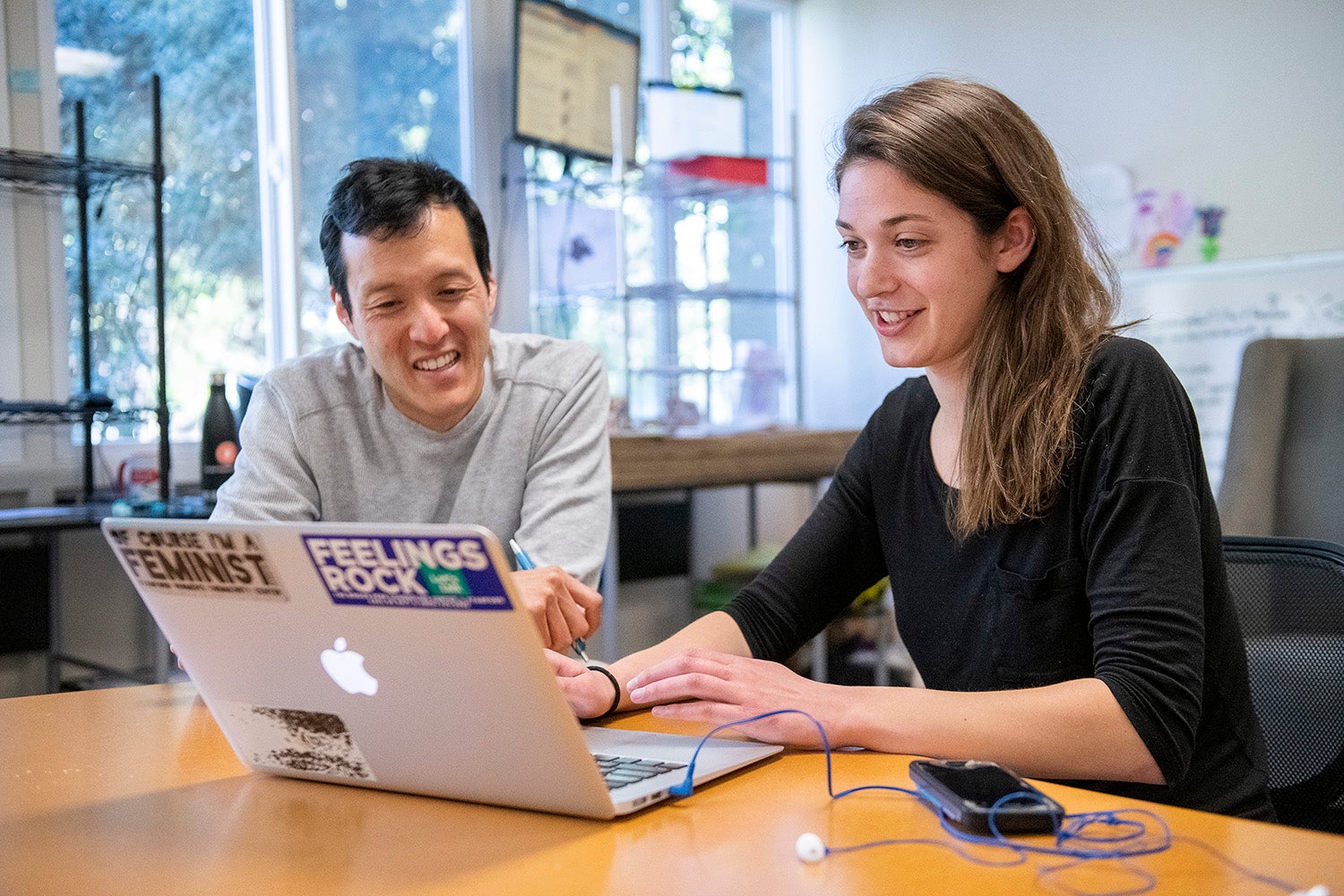 Claire Howlett, right, works with her mentor, George Wang, who earned a doctorate in biology at Stanford in 2009, and is a co-founder of SIRUM, a nonprofit organization that distributes surplus medicine to clinics and pharmacies serving low-income patients.