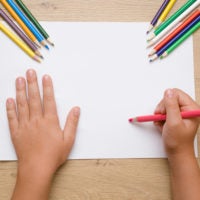 Girl ready to draw picture.