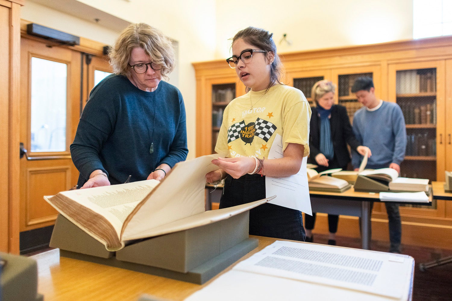 Professor Elaine Treharne works with Lore Olivera at Stanford Libraries Special Collections in the Humanities Research Intensive class taught over spring break.