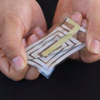 Using metallic ink, researchers screen-print an antenna and sensor onto a stretchable sticker designed to adhere to skin, tracking pulse and other health indicators, and beaming these readings to a receiver on a person’s clothing.