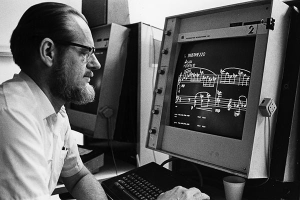 Leland Smith led music publishing into the digital age. In this 1976 photo, he works with music displayed on a CRT monitor.