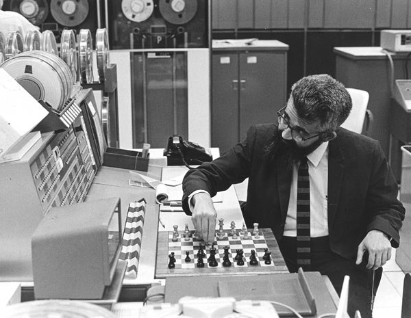 In 1966, John McCarthy hosted a series of four simultaneous computer chess matches carried out via telegraph against rivals in Russia.